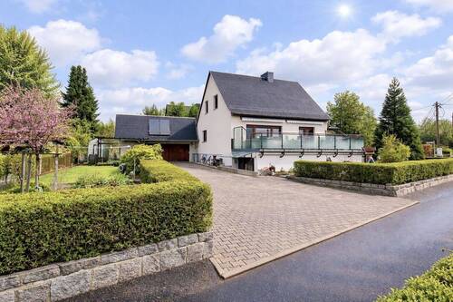 Außenansicht - Das Eigenheim mit Wohlfühlfaktor! Vollsaniertes Haus in ruhiger, grüner Wohnlage