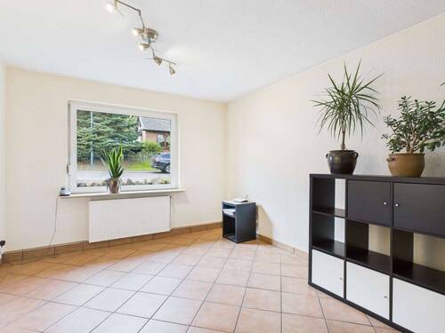 Wohnzimmer - Einfamilienhaus mit 107,10 m² in Buchhorst zum Kaufen