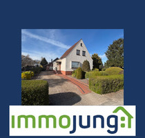 Einfamilienhaus mit zusätzlichem Nebengebäude und großzügigem Garten in zentraler Lage von Grasberg