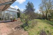 Terrassen- und Gartenansicht - Einfamilienhaus mit 185,00 m&sup2; in München zum Kaufen
