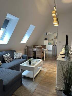 Wohnzimmer - Traumhafte Ferienwohnung in Timmendorfer Strand Ihr perfektes Investitionsprojekt!