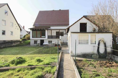 Gartenansicht - Zweifamilienhaus mit Ausbaupotenzial in ruhiger Ortsrandlage von Altrip