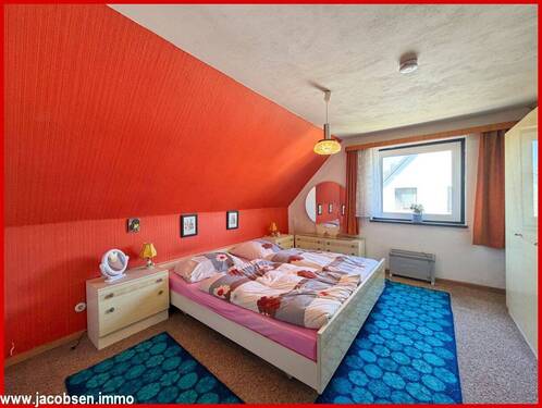 Schlafzimmer im Dachgeschoss - 