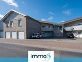 Hausansicht - Moderne Erdgeschosswohnung mit privatem Gartenanteil und hohem Wohnkomfort auf 79m² Wohnfläche