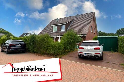 Außenansicht - Moderne & familienfreundliche Doppelhaushälfte mit Garten in ruhiger Lage von Kummerfeld