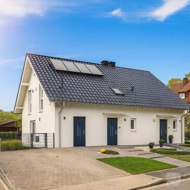 Front - Wohnen & Wohlfühlen: Großes Haus mit 2 Wohneinheiten, Gartenparadies und privater Sauna