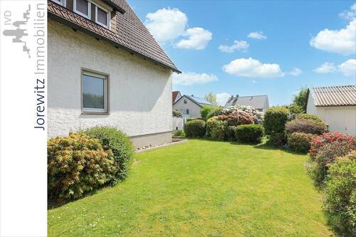 004 - Seitenansicht Garten - Einfamilienhaus mit 125,00 m² in Bielefeld zum Kaufen