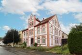 Außenansicht - Altbaucharme mit Entwicklungspotenzial: 6-Parteien-MFH in Rahden