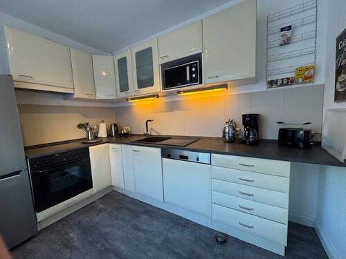 Küche mit Einbauküche - 