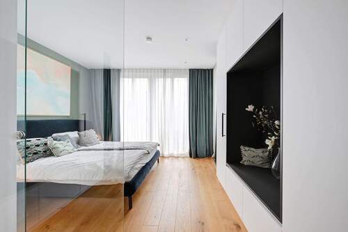 Schlafen wie im Designhotel! Hoher Wohlfühlfaktor im Masterbedroom mit stilvollen Schreinereinbauten - 