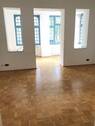 Wohnzimmer - IMPOSANTE WOHNUNG MIT WINTERGARTEN UND PARKETT