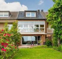 Großzügiges Reihenmittelhaus mit Einliegerwohnung, Wintergarten und Blick ins Grüne in Köln-Zündorf