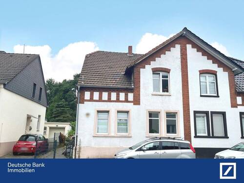 Vorderansicht - Charmante Doppelhaushälfte mit Garten in Bottrop