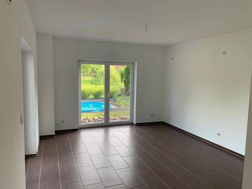 Wohnzimmer - Einfamilienhaus mit 125,00 m² in Oranienburg zum Kaufen