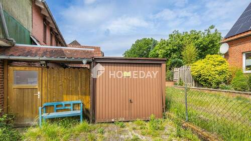 Garage - Einfamilienhaus mit 210,00 m² in Bippen zum Kaufen