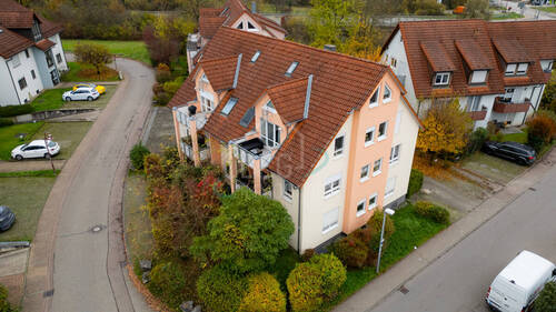 Außenansicht - Lichtdurchflutete Erdgeschosswohnung mit Garage und Stellplatz