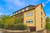 Gebäudeansicht - Großzügige, renovierte 3,5-Zimmerwohnung mit großem Südbalkon in bevorzugter Lage
