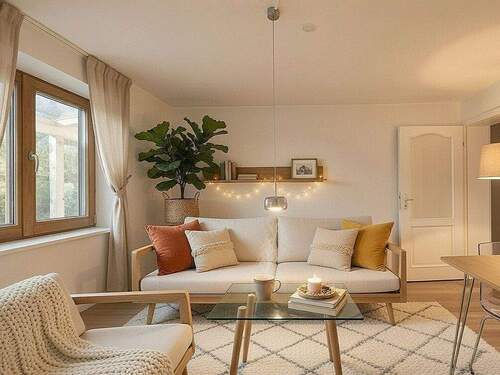 Wohnzimmer Emotionsbild - Terrassenwohnung mit 74,00 m&sup2; in Königsdorf / Niederham zum Kaufen