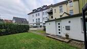 Rückansicht - Saniertes Haus mit luxuriöser Ausstattung - 91 m² Komfortwohnung mit Garten und Bungalow.