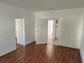 Wohnzimmer - 2-Zimmer-Erdgeschoß - Wohnung in Regis-Breitingen