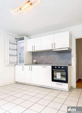 Küche mit Einbauküche - 