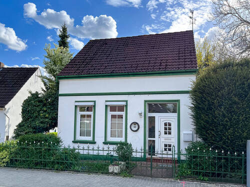 Bild 1 - PURNHAGEN-IMMOBILIEN - Charmantes Einfamilienhaus in ruhiger Seitenstraße von Fähr-Lobbendorf!