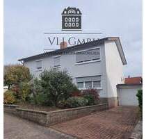 Zweifamilienhaus in St. Ingbert-Hassel - gepflegtes Wohnhaus mit großem Garten und flexibler Nutzung - Sankt Ingbert / Hassel