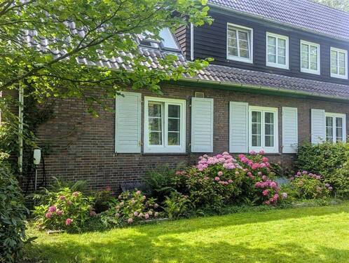 Ansicht vorn - 8 Zimmer Doppelhaushälfte zum Kaufen in Schortens