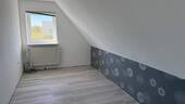 Zimmer im Dachgeschoss - 