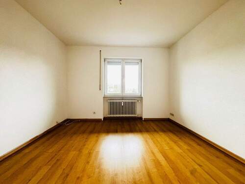 Bild 2 - Familienfreundliche 4-Zimmer-Wohnung mit Balkon, Garage & eigenem Garten