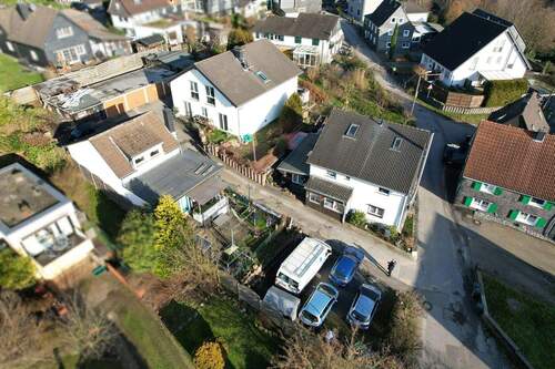 Ansicht links - 2 Zimmer Mehrfamilienhaus, Wohnhaus zum Kaufen in Burscheid / Heddinghofen