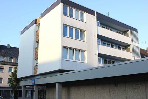 Haus hinten - Vermietete Wohlfühloase unterm Dach - 4-Zimmerwohnung mit Balkon und Weitblick in Küppersteg!