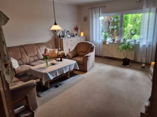 Wohnzimmer - Etagenwohnung mit 61,40 m² in Wittmund zum Kaufen