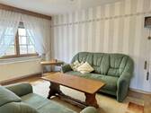 Wohnzimmer - Einfamilienhaus mit 100,00 m² in Gladbach zum Kaufen