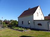 Ansicht Wohnhaus + Gargage - 4 Zimmer Einfamilienhaus zum Kaufen in Wermsdorf OT Lampersdorf