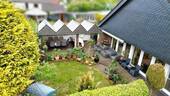 Garten mit überdachter Terrasse - 