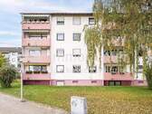 Außenansicht - Hell und charmant: 3-Zimmer-Wohnung mit Balkon und Garage in Neureut