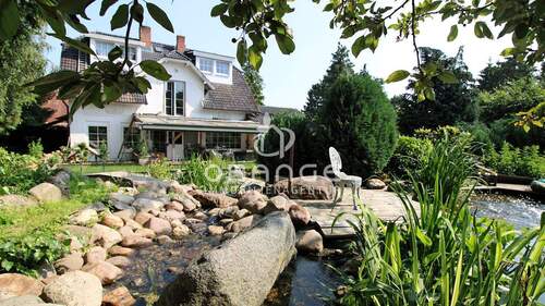 Bild 1 - ***Haus mit zwei Wohneinheiten, großem Garten, Teich und vielen Extras***
