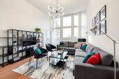 Wohnzimmer - (KI - bearbeitet) - Lichtdurchflutete Loftwohnung in Moosach mit einer möglichen Dachterrasse