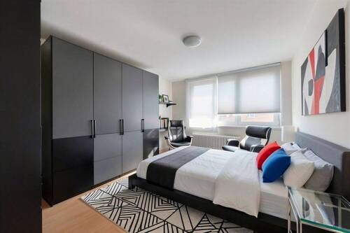 Schlafzimmer 1 - (KI bearbeitet) - 3 Zimmer Etagenwohnung in München