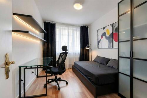Schlafzimmer 2 - (KI bearbeitet) - Etagenwohnung mit 70,00 m&sup2; in München zum Kaufen