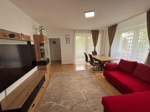 Wohnzimmer - Etagenwohnung mit 70,40 m² in Heusenstamm zum Kaufen