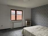 Schlafzimmer im Erdgeschoss - 6 Zimmer Mehrfamilienhaus, Wohnhaus in Soltau