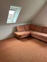 Wohnzimmer im Dachgeschoss - 