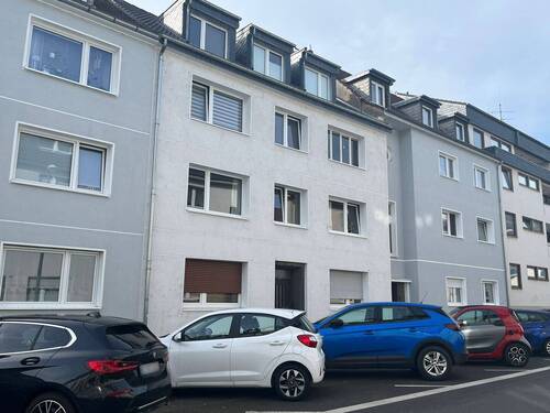 Außenansicht links B - 2 Zimmer Etagenwohnung zum Kaufen in Köln Dellbrück