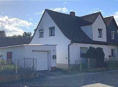 Außensansicht - DHH in Wansleben am See - 120.000,00 EUR Kaufpreis, ca.  120,00 m² Wohnfläche