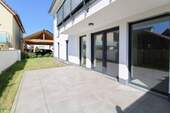 Terrasse & Garten - Moderne, barrierefreie Erdgeschosswohnung mit Terrasse, WP & 2 Carports - Neubauqualität in Goldbach