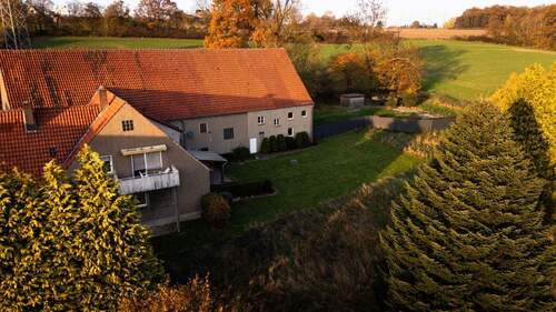 Außenansicht - Einzigartige Investmentchance: Zweifamilienhaus mit Gewerbeeinheit und großem Entwicklungspotenzial