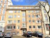 Blick auf das Haus - Top-Lage Univiertel: 2-Zimmer-Wohnung mit Entwicklungspotenzial