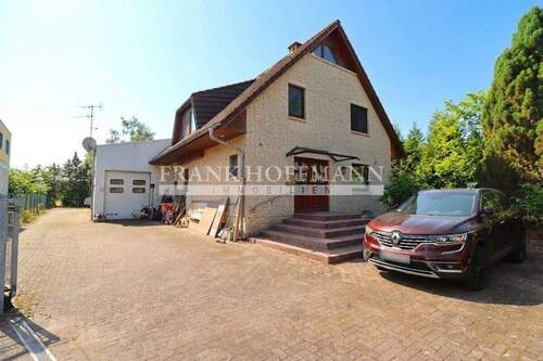 V10256 Außenaufnahme 1 - 4 Zimmer Einfamilienhaus zum Kaufen in Quickborn
